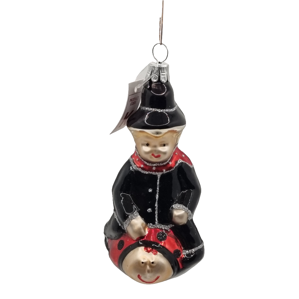 European Glass Christmas ornament of a Child | Riding Ladybug (K)
