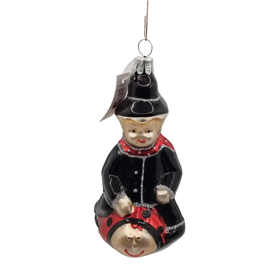 European Glass Christmas ornament of a Child | Riding Ladybug (K)