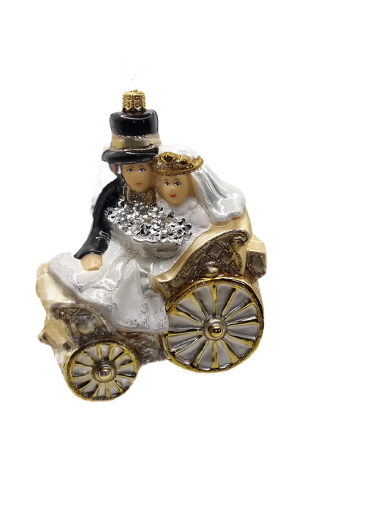 European Glass Christmas ornament of a Bridal Couple In Wedding Carriage (Y)