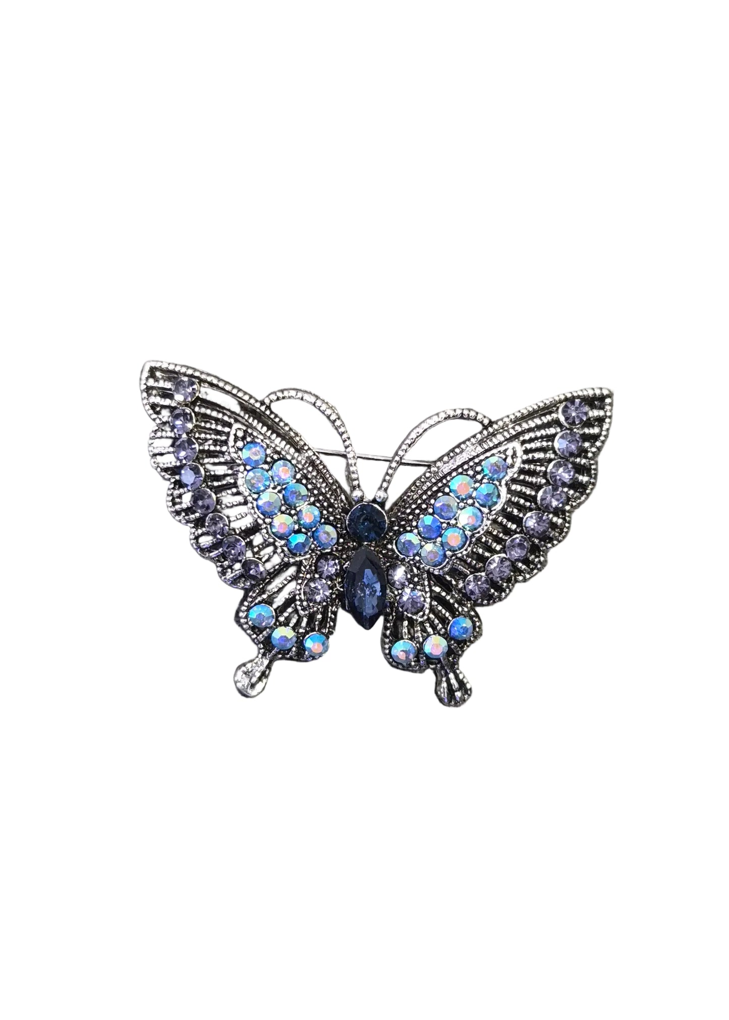 A butterfly-shaped brooch with silver-toned metalwork, blue faceted beads, and a dark blue central jewel.