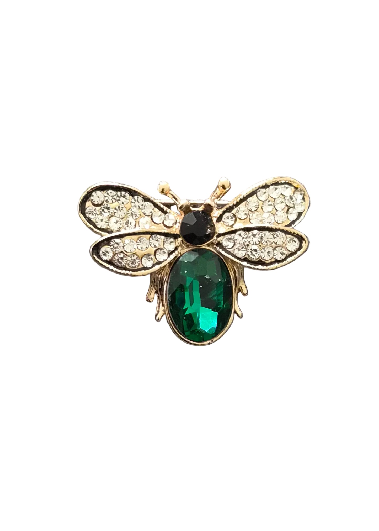 A gold-tone bee-shaped brooch with a large green oval gemstone body, clear rhinestone wings, and a small black gemstone head.