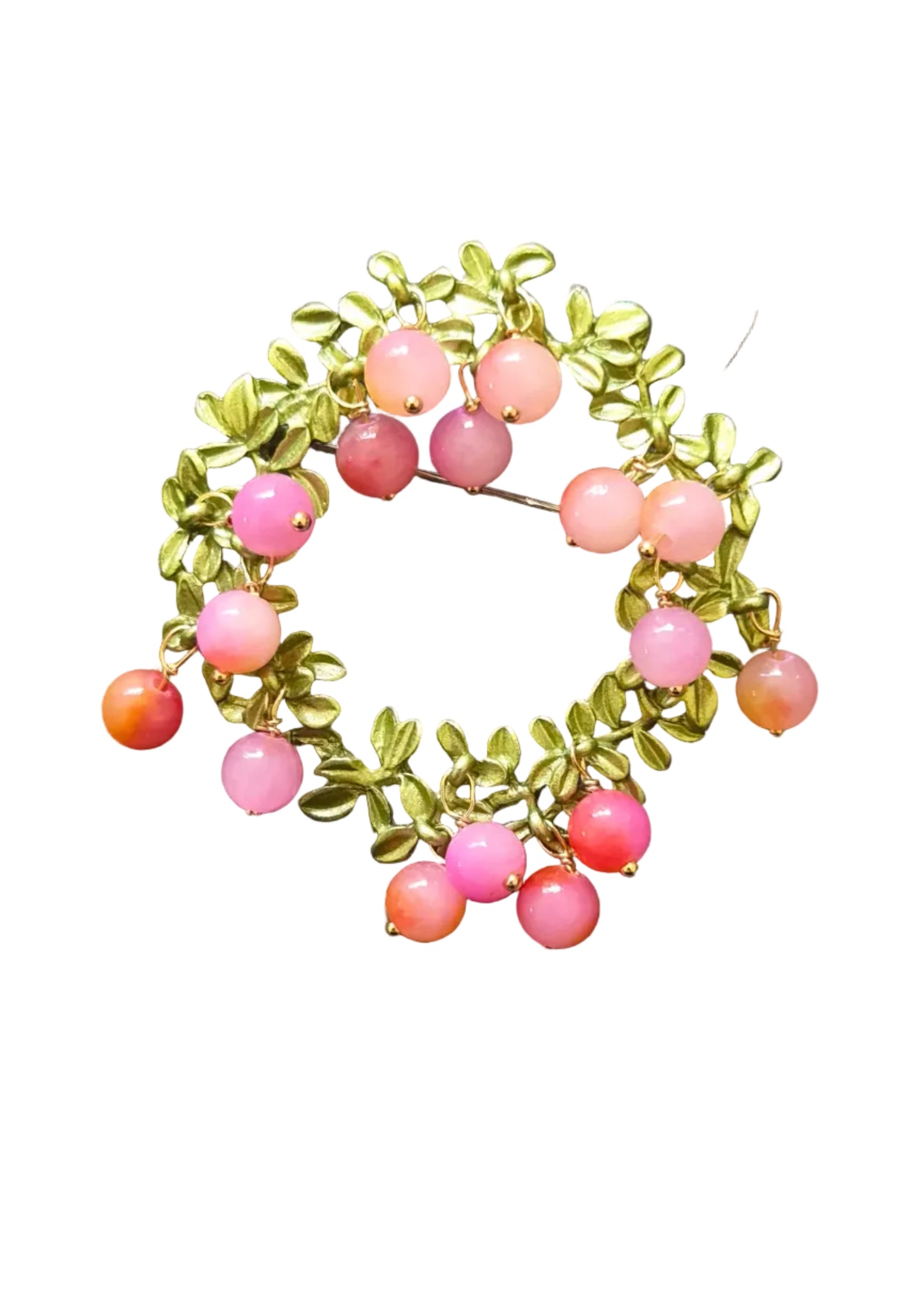A gold-toned leafy wreath brooch decorated with pink and orange cabochon beads.