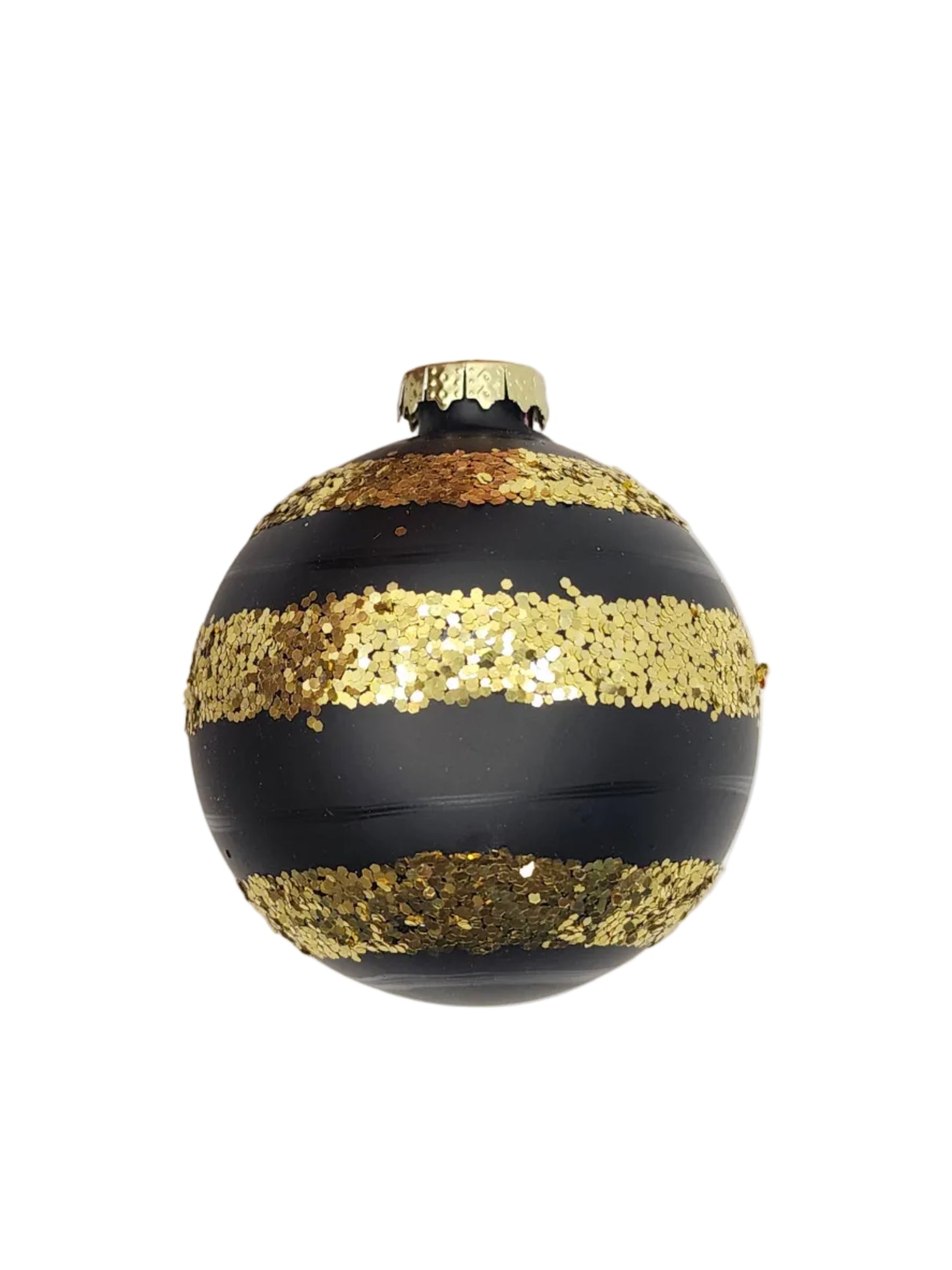 Black ornament with gold sequins against a white background