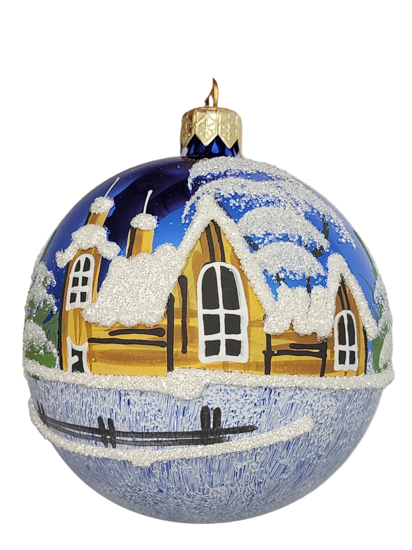 Decorative ornament with ship design against a plain background