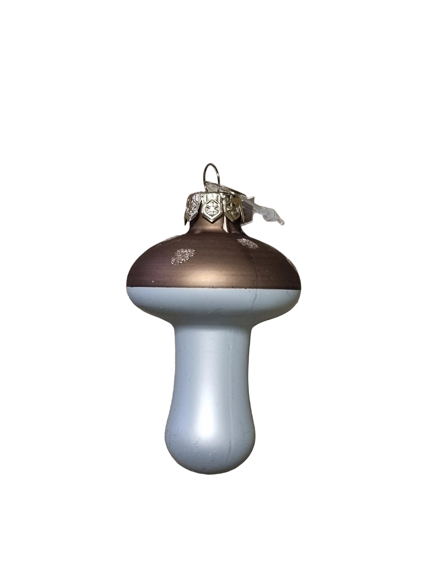 Decorative glass mushroom ornament on a white background