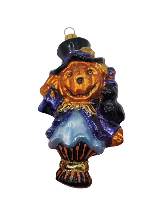European Glass Christmas or Halloween ornament of a scarecrow with orange pumpkin head and black hat