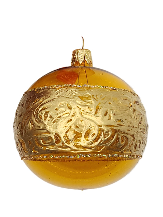 Decorative ornament with gold detailing  against a white background