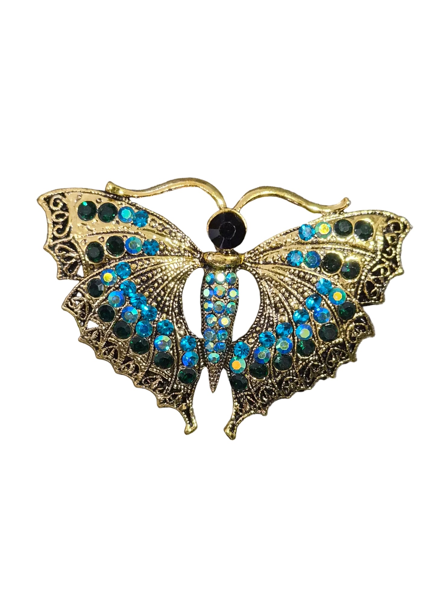 A gold-toned metal moth brooch embellished with iridescent blue and green rhinestones.