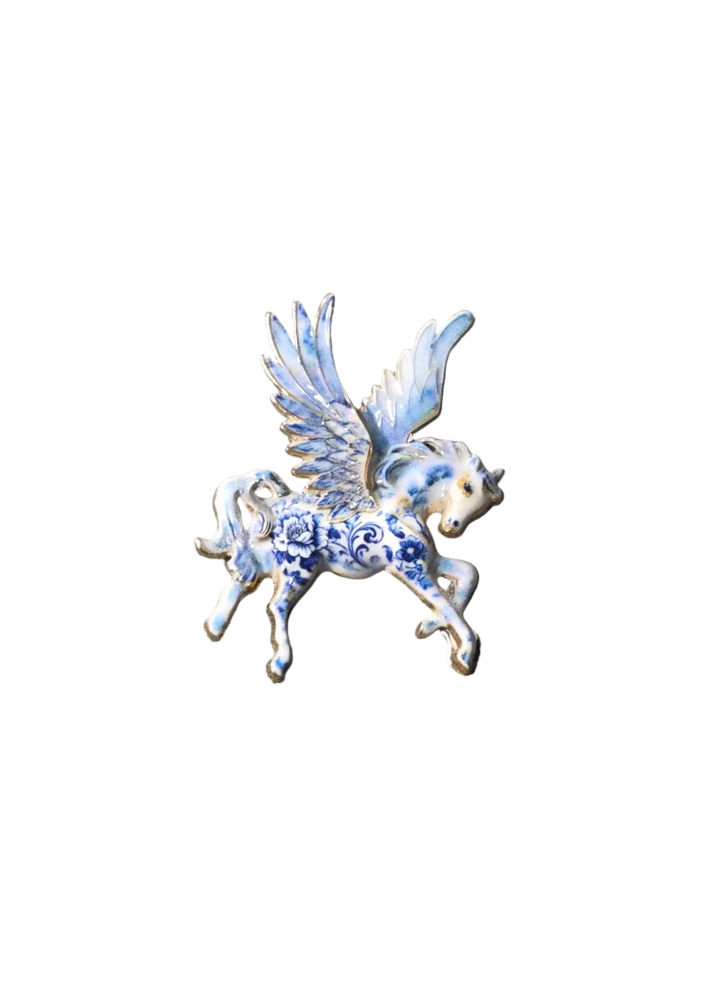 A small blue and white enamel winged horse brooch with floral detailing