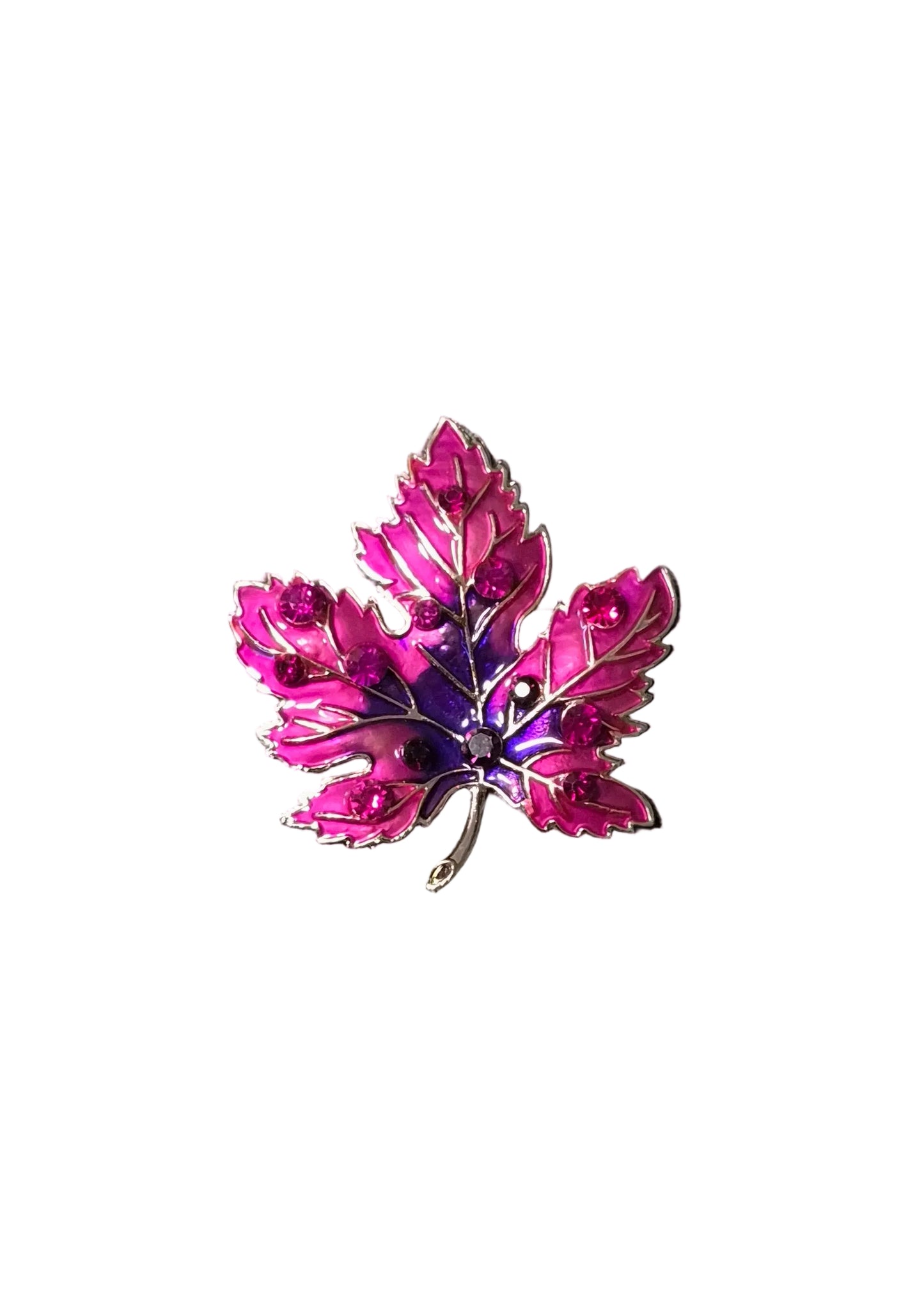 A small enamel maple leaf brooch in vibrant pink and purple