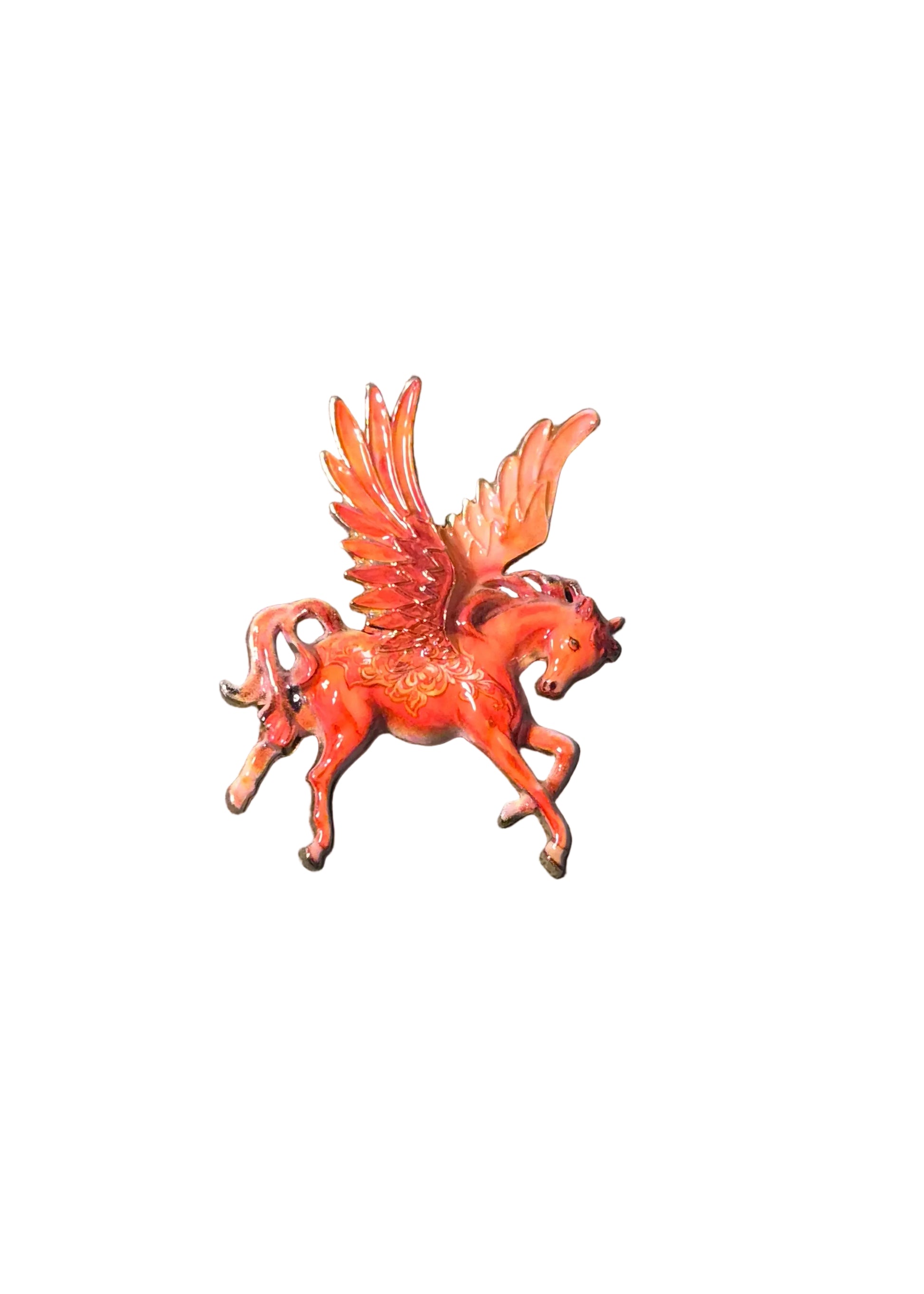 A small red-orange pegasus brooch with spread wings
