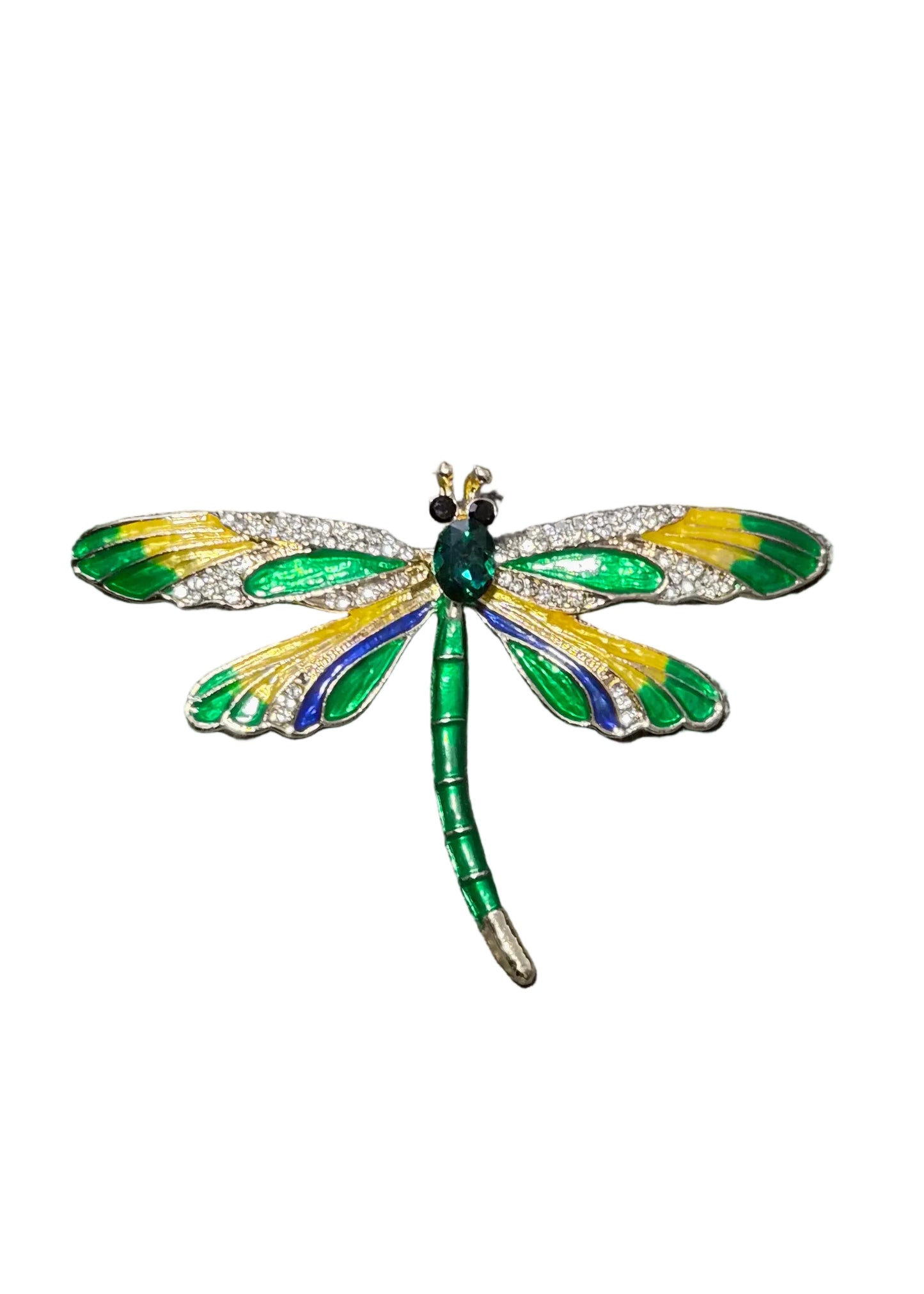 A dragonfly-shaped brooch with vibrant green, yellow, and blue enamel details