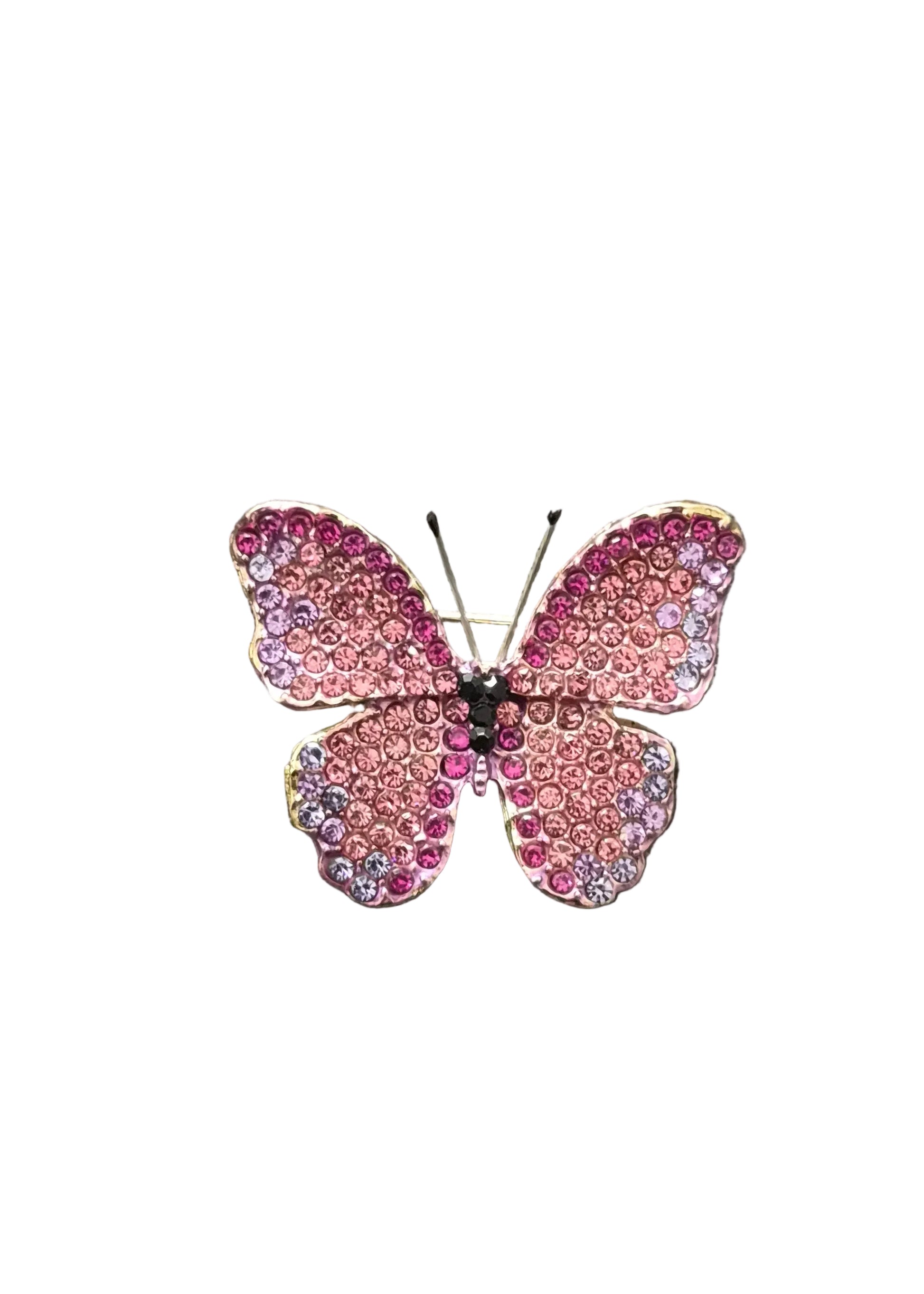 A butterfly-shaped brooch embellished with pink and purple rhinestones.