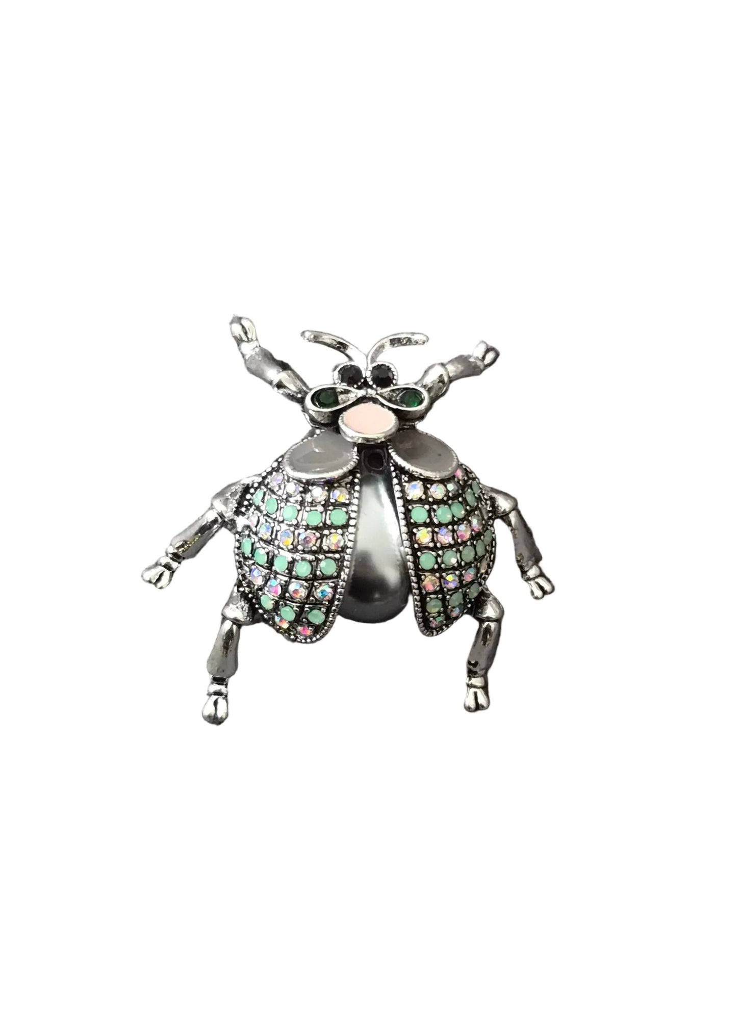 A metallic beetle-shaped brooch with green and pink rhinestone-embellished wings.