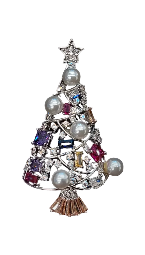 Jewelry tree-shaped brooch with pearls and gemstones on a white background