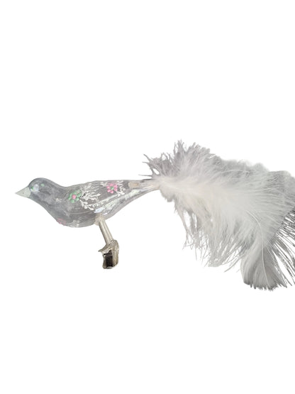 Colorful bird-shaped glass Christmas ornament on a clip