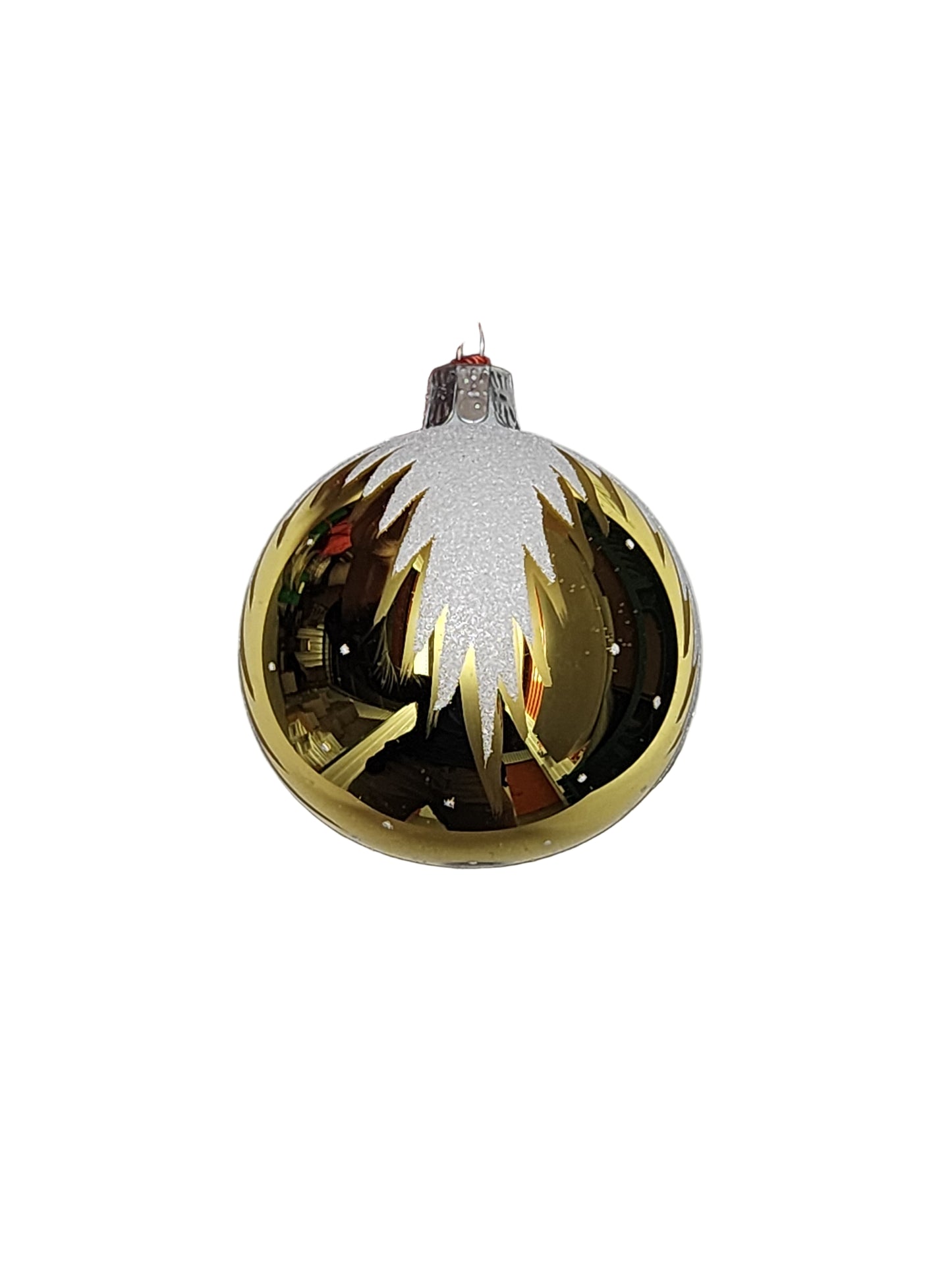 Gold Christmas ornament against a white background